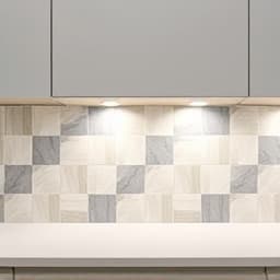 Custom kitchen backsplash installation with modern design